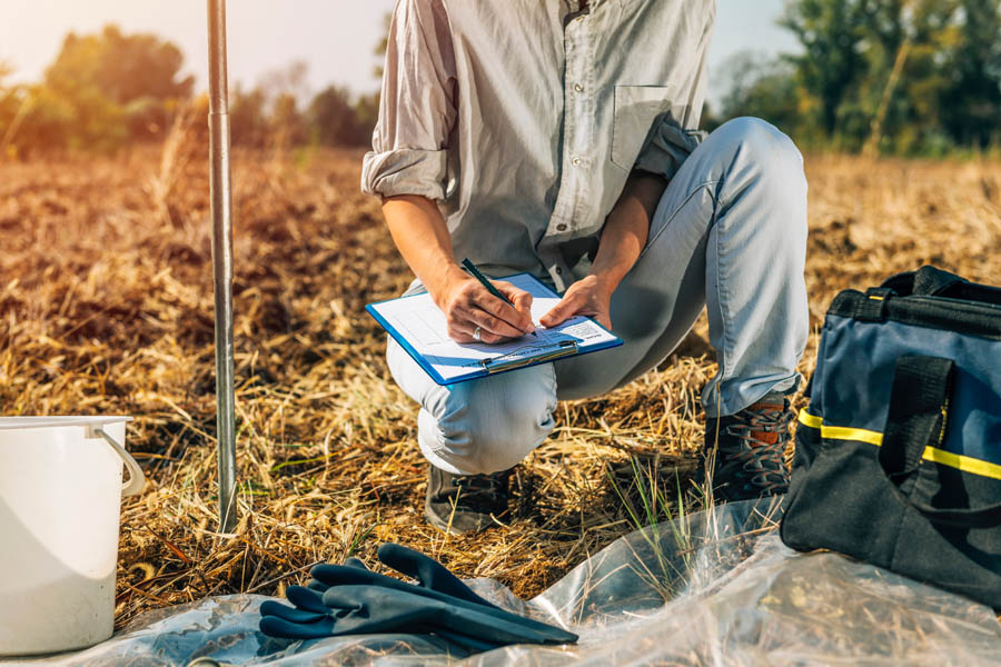 Soil,Test.,Female,Agronomist,Taking,Notes,In,The,Field.,Environmental